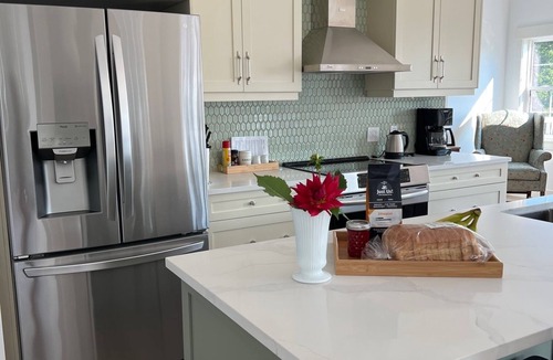 Little Pond Apartment | Upper level end unit with wate view in every direction