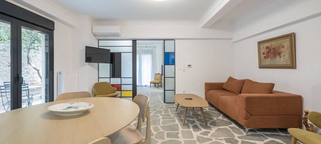 Centric designed apartment with a garden