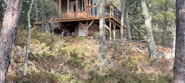Extremely private remote get away, nestled in the pine trees on pristine lake in Longbow lake