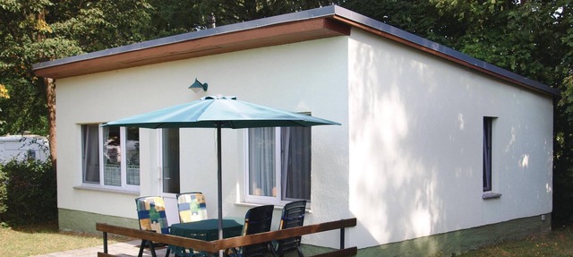 The open plot on which this solid and comfortably furnished vacation bungalow in Brandenburg stands in Brüssow
